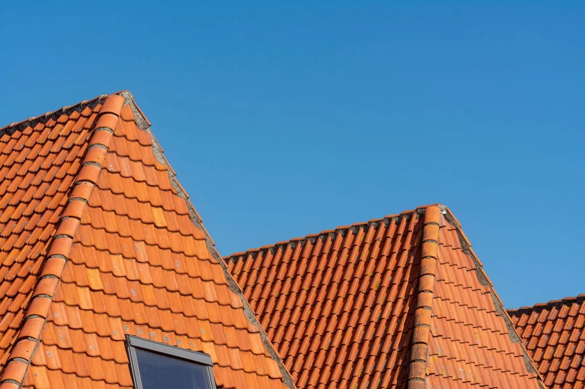 Clay barrel tile rooflines on homes in Victoria, TX